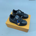 Louis Vuitton Studded Low-Top Sneakers in White and Black