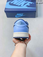 Nike Air Jordan 1 Low Sneakers in White and Blue