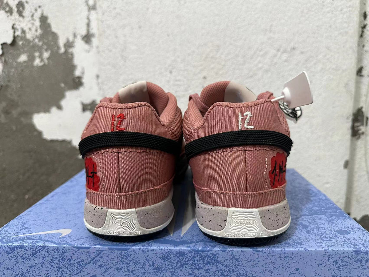 Nike GT Cut Academy Sneakers in Dusty Pink
