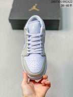 Jordan Air Jordan 1 Low Sneakers in White and Lavender