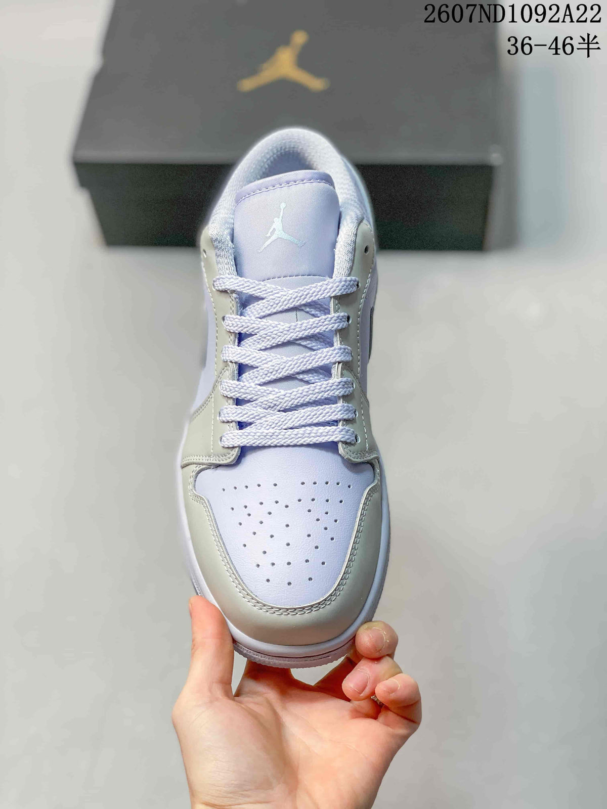 Jordan Air Jordan 1 Low Sneakers in White and Lavender