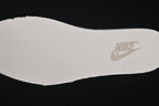 Nike SB Dunk Low Sneakers in White and Soft Pink