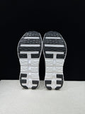 On Cloudtilt Sneakers in Ivory and Black