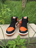 Jordan 1 High Sneakers in Black, White and Orange