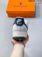Low-Top Sneakers in White and Black with Monogram Details