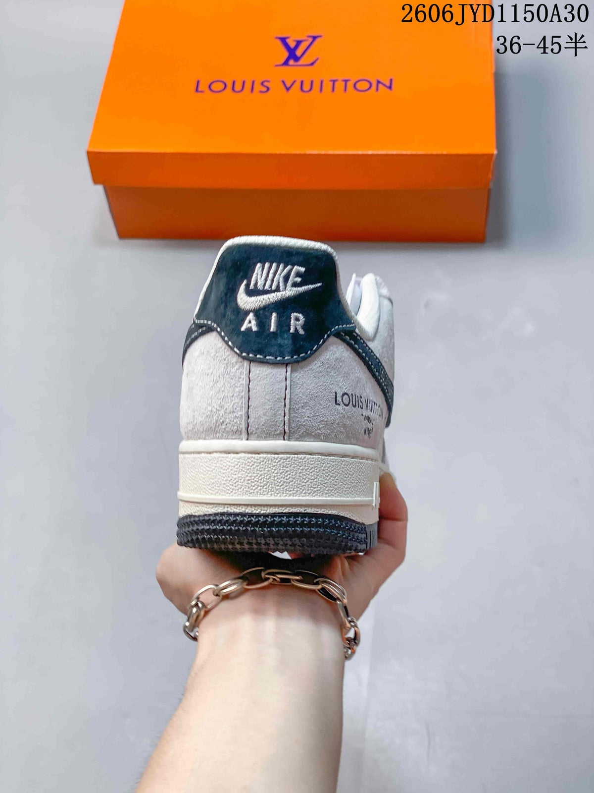 Low-Top Sneakers in White and Black with Monogram Details