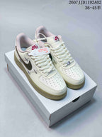 Nike Air Force 1 ’07 Low Sneakers in White and Olive