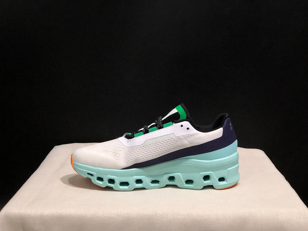 On Cloudmonster Running Shoes in White and Aqua