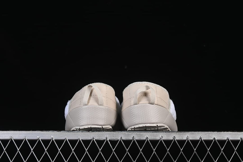The North Face Thermoball Traction Mule in Beige and White