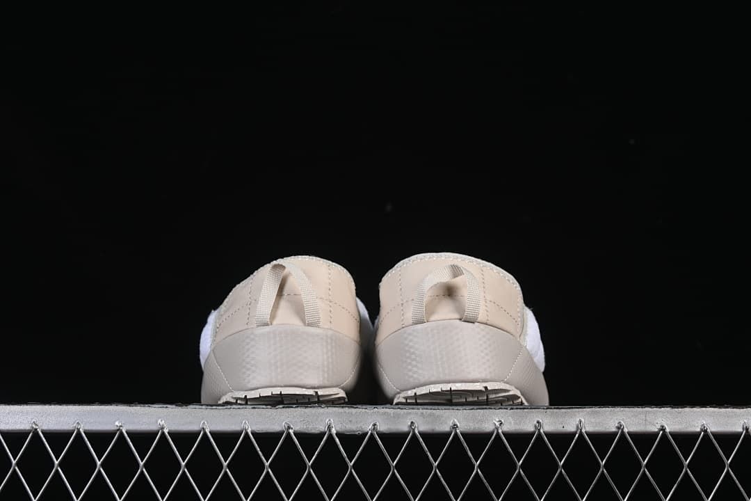 The North Face Thermoball Traction Mule in Beige and White