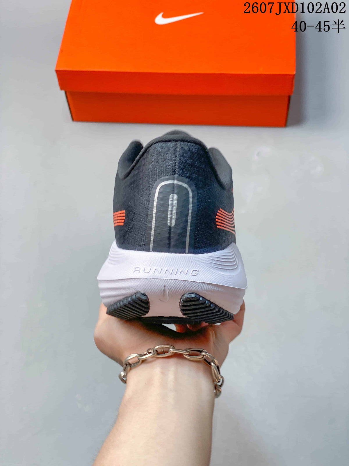 Nike Vomero Running Shoes in Charcoal and Orange