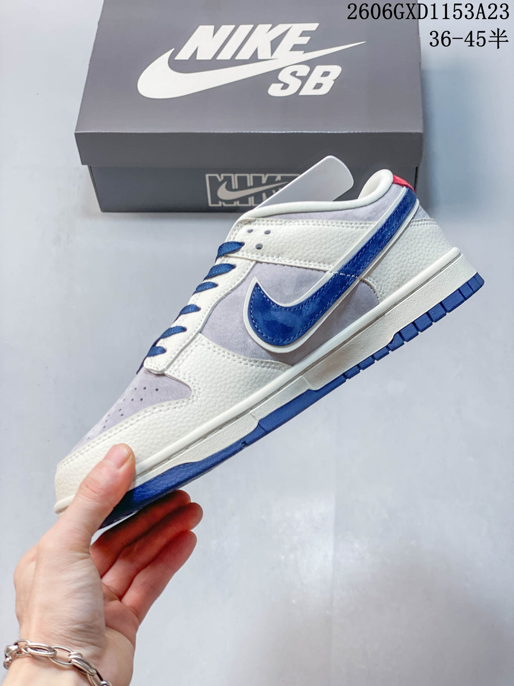 Nike SB Dunk Low Bearbrick-Inspired Cream and Blue Sneakers