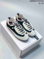 Chanel Two-Tone Low-Top Sneakers, Black and White, 2606HGD1825A25