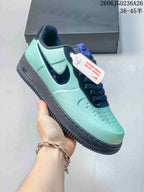 Nike Air Force 1 '07 Low Sneakers in Mint Green and Navy
