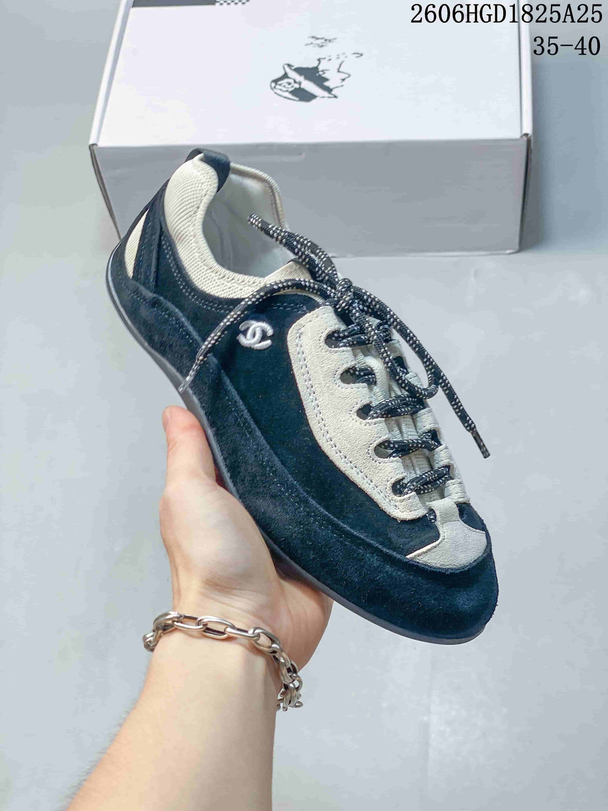 Chanel Black and White Low-Top Trainer