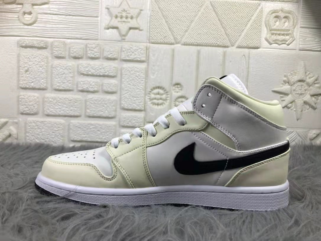 Jordan Air 1 Mid Sneakers Cream White and Black