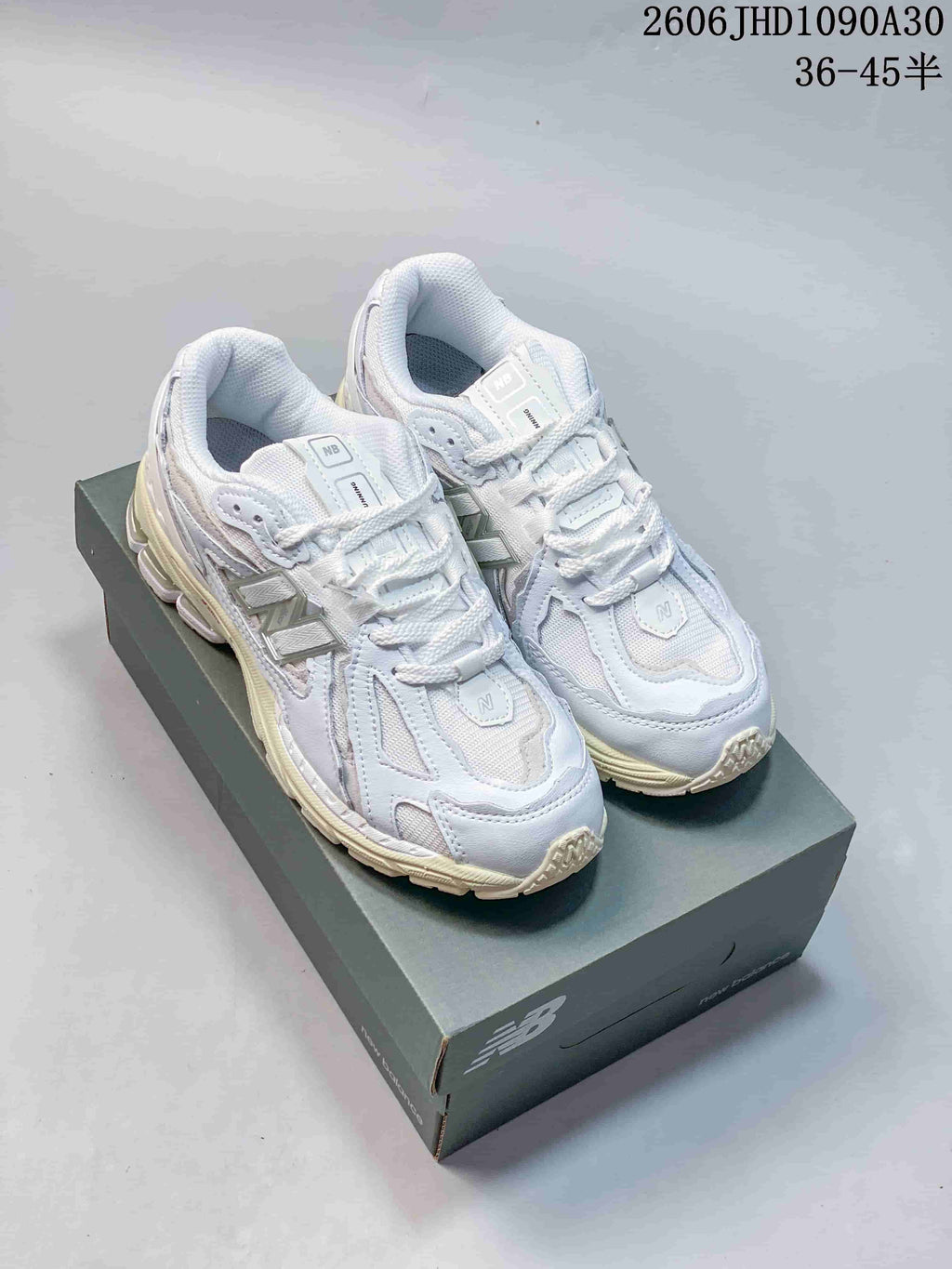 New Balance M1906R Sneakers in White and Silver