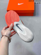 Nike Vapor 12 Low-Top Tennis Shoes White and Coral