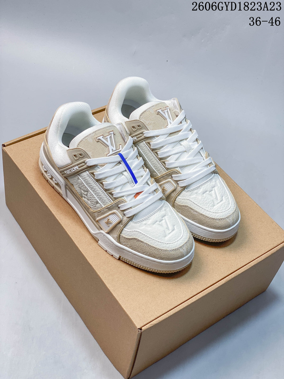 Louis Vuitton Trainer Low-Top Sneakers in White and Beige