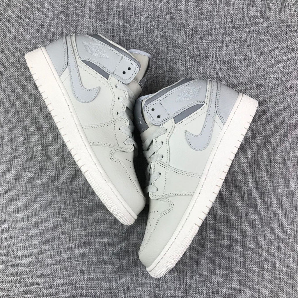 Air Jordan 1 Mid Sneakers in White and Grey