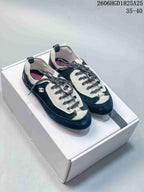 Chanel Two-Tone Low-Top Sneakers, Black and White, 2606HGD1825A25