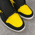 Air Jordan 1 Mid Black and Yellow Sneakers