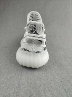 Yeezy 350 V2 Knit Sneakers in Black and White