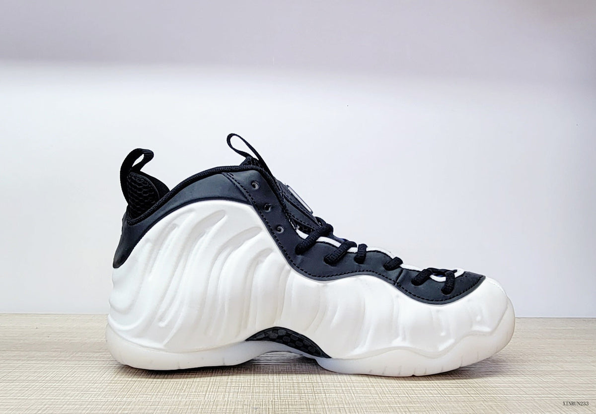 Nike Air Foamposite One High-Top Sneakers in Black, White and Blue