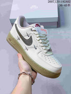 Nike Air Force 1 ’07 Low Sneakers in White and Olive