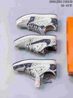 Air Jordan 1 Low OG SP Monogram Print Sneakers