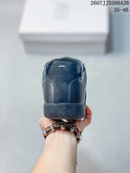 Maison Margiela Replica Wedge Low-Top Sneakers in Black DX003DGR41