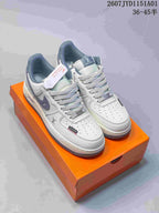 Nike Air Force 1 ’07 Low Monogram Sneakers, White and Navy