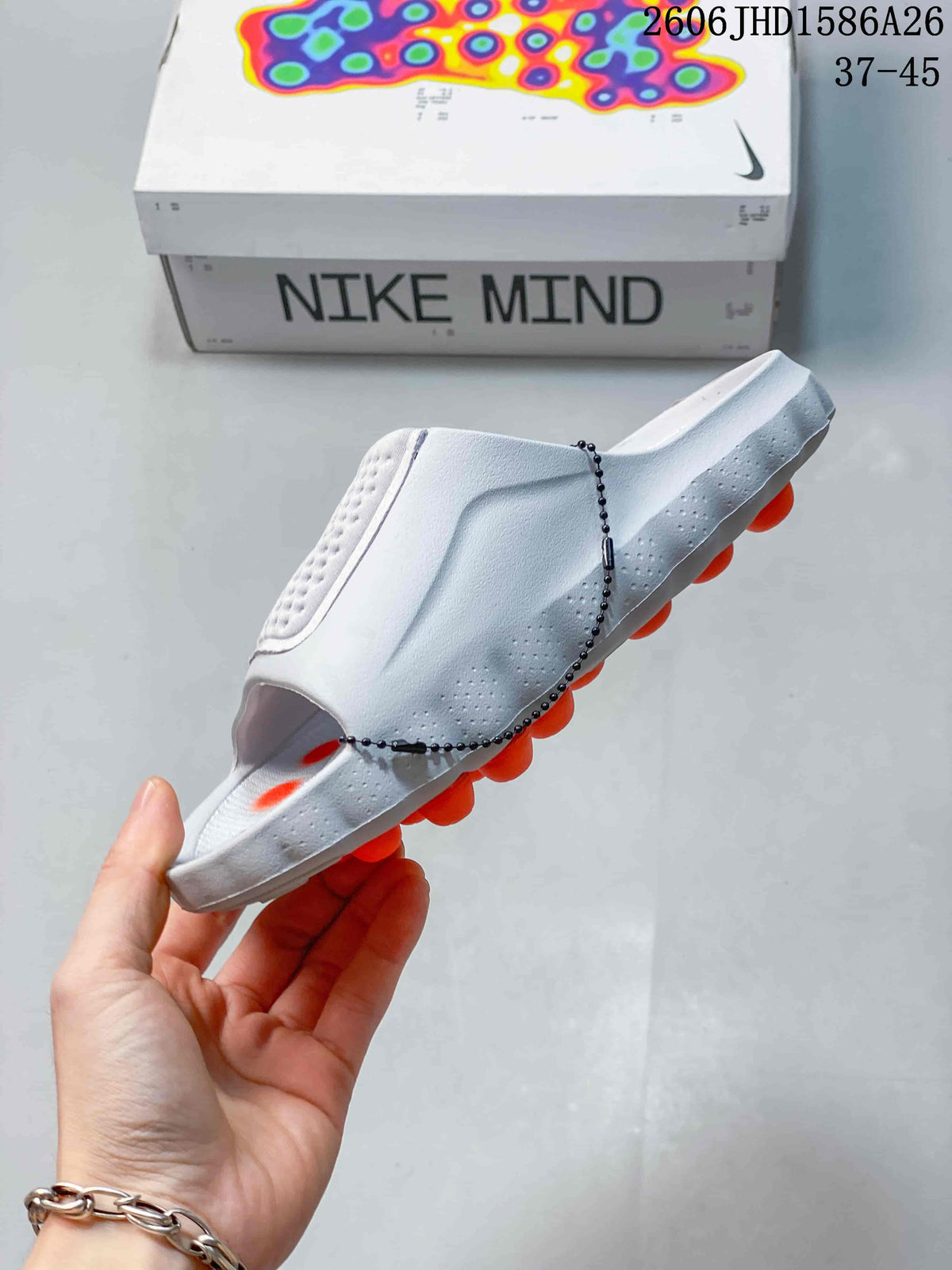 Nike Mind 001 Slide Sandals in White and Orange