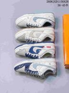 Nike Dunk Low Sneakers in White and Blue Monogram Style