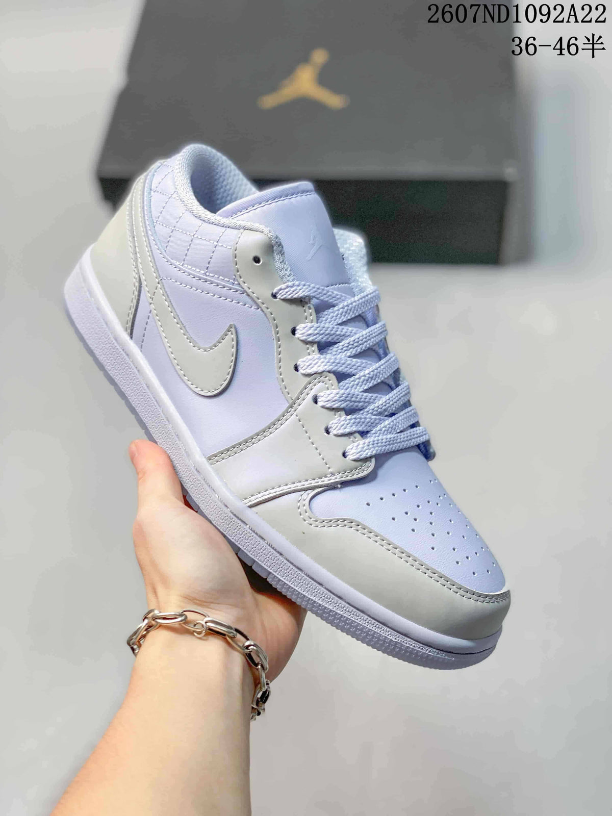 Jordan Air Jordan 1 Low Sneakers in White and Lavender