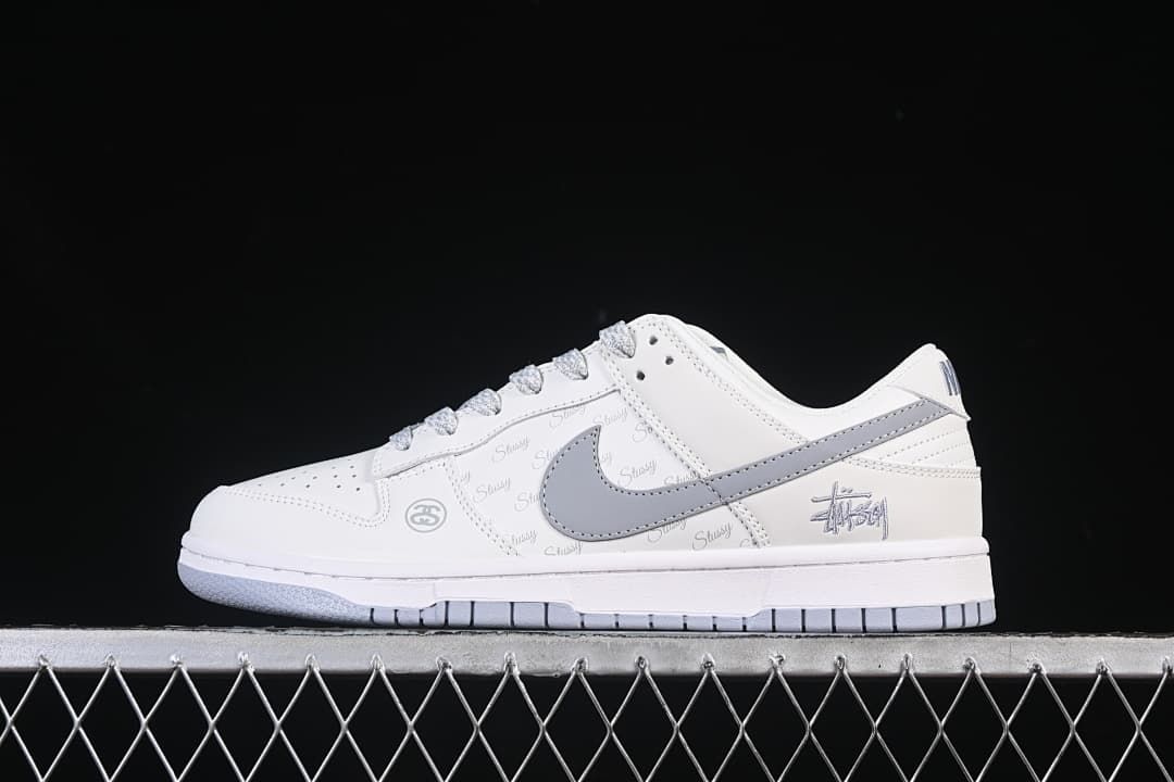 Nike SB Dunk Low White and Grey Stüssy Print Sneakers