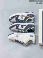 Nike Dunk Low Sneakers in White and Navy with Monogram Print