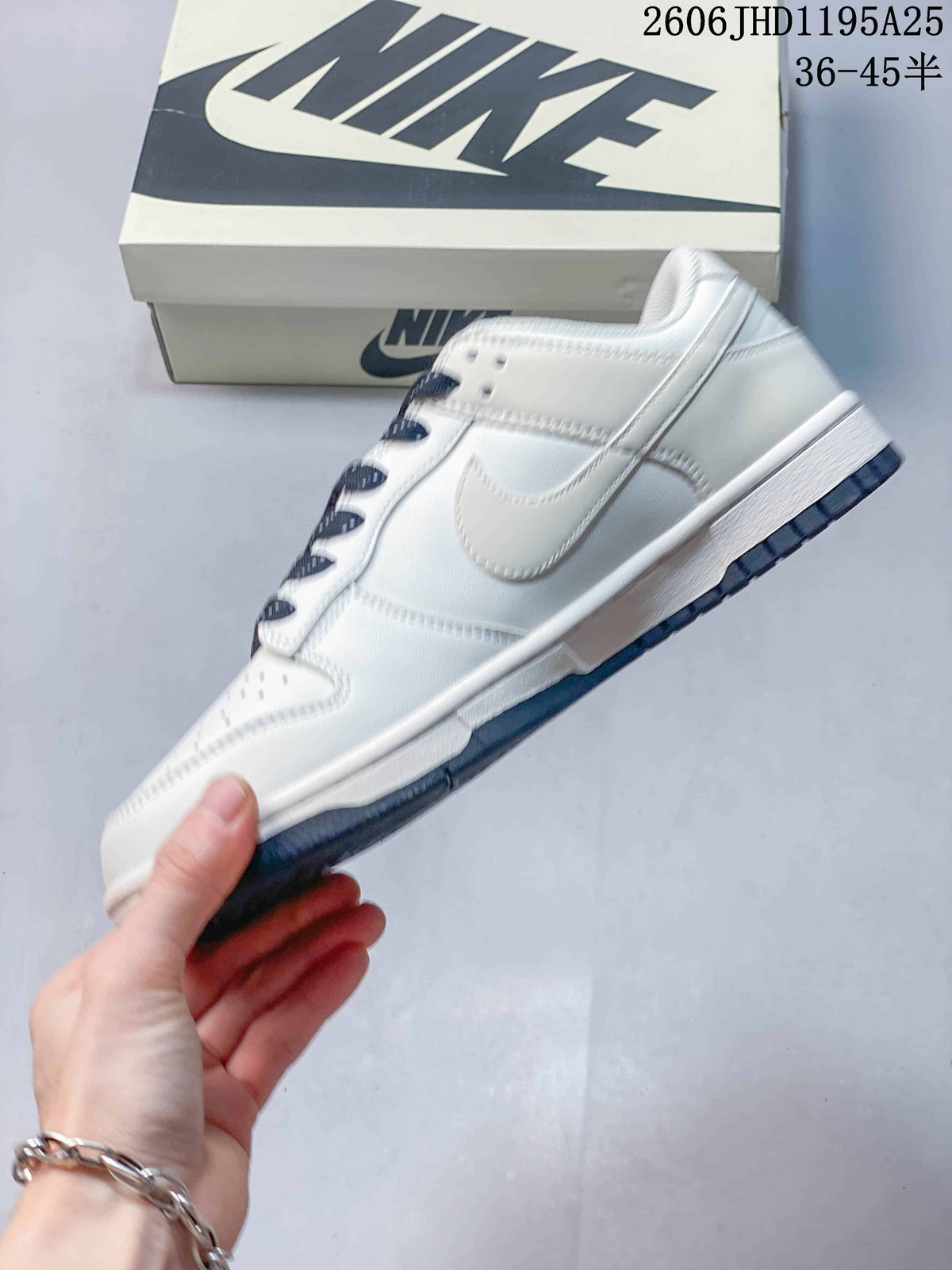 Nike Dunk Low White Sneakers with Navy Laces