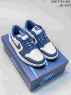 Nike Air Jordan 1 Low Sneakers in White and Blue