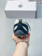 Chanel Black and White Low-Top Trainer