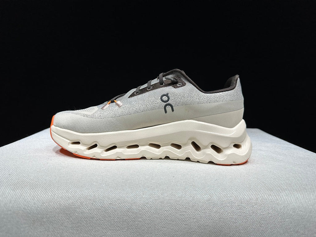 On Cloudtilt Sneakers in Gray and Apricot