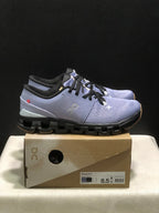 On Cloud X 4 Sneakers in Feather Black