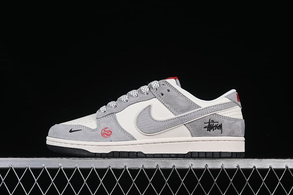 Nike SB Dunk Low Stüssy Snake Year Gray and Off-White Sneakers