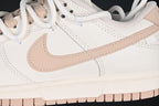 Nike SB Dunk Low Sneakers in White and Soft Pink