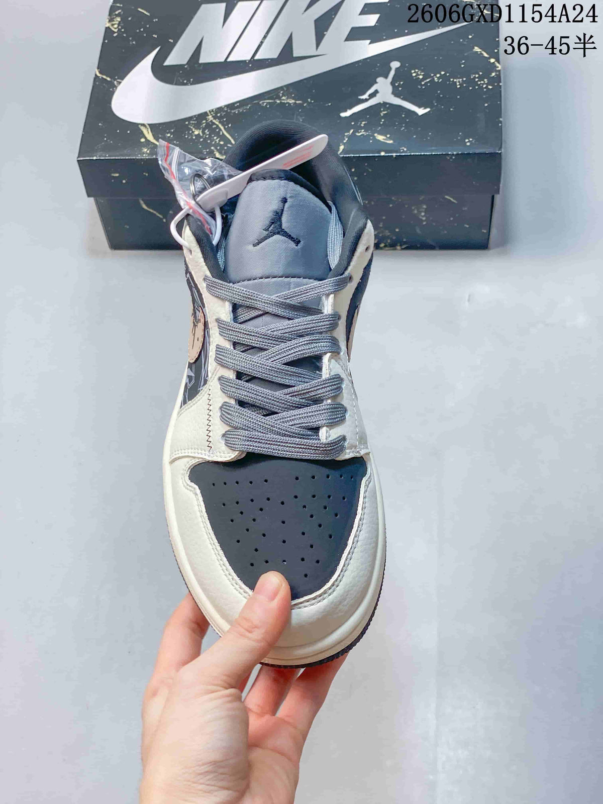 Jordan 1 Low Graffiti Sneakers in Gray and Cream