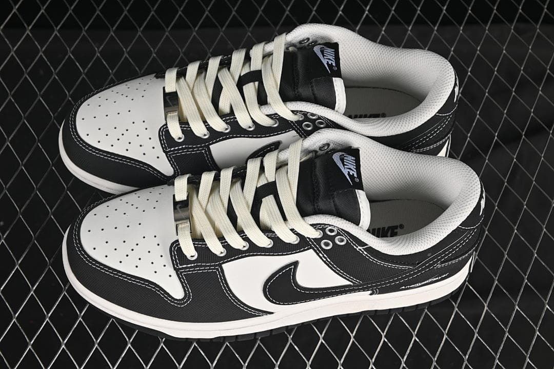 Nike SB Dunk Low Sneakers in Black and White