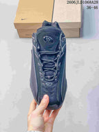 Nike NOCTA Glide Black/White Low-Top Sneakers