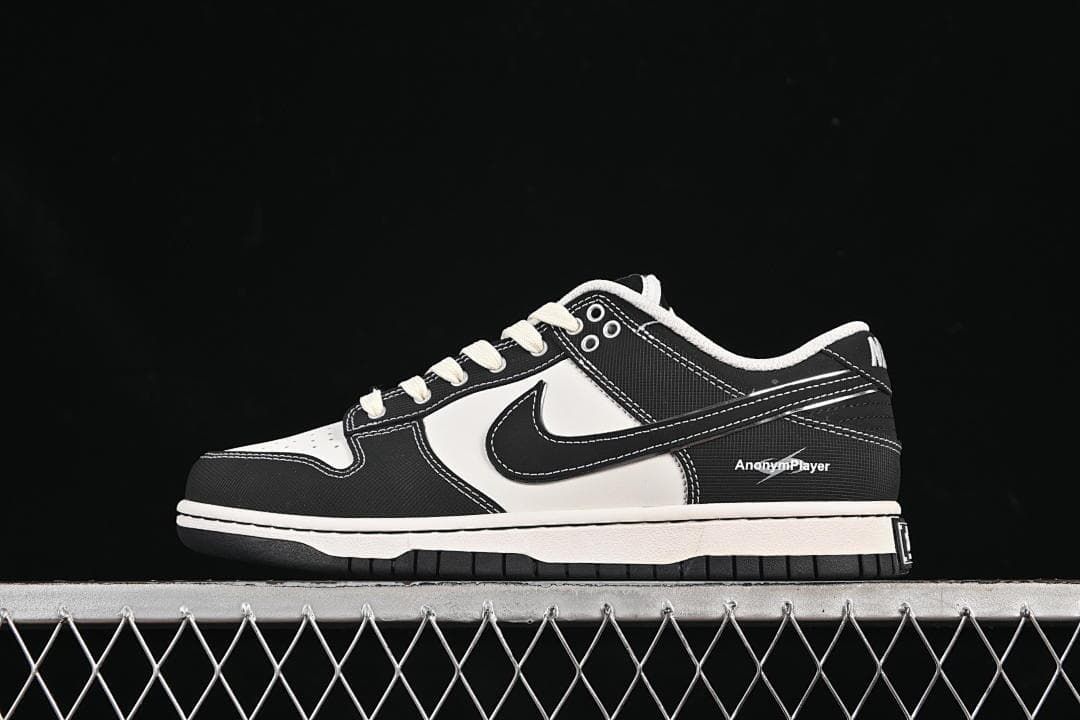 Nike SB Dunk Low Sneakers in Black and White