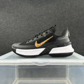 Nike Black and White Basketball Sneakers with Gold Swoosh
