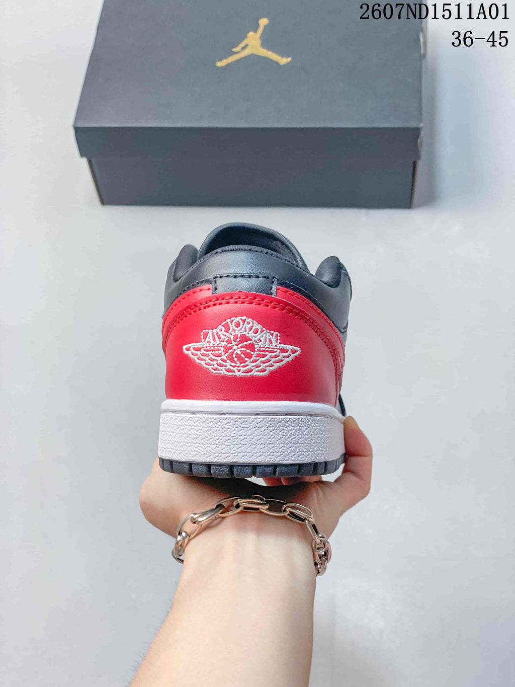 Jordan Air Jordan 1 Low Bred Black and Red Sneakers